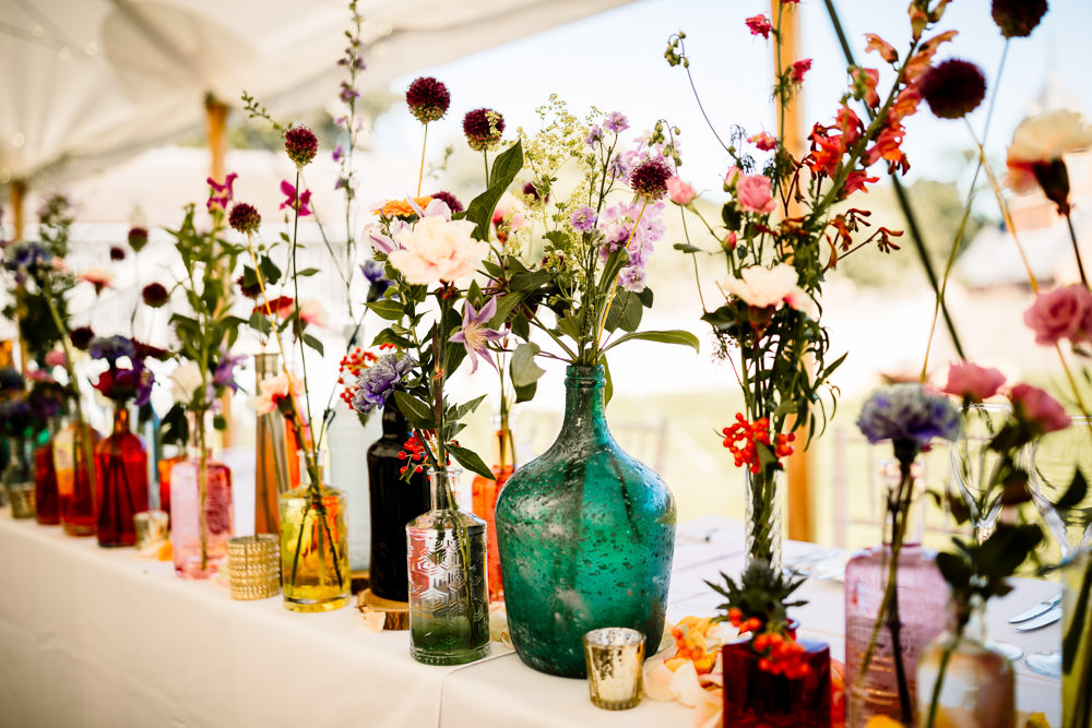 Centepiece Flowers Wild Flowers Decor Table Bottles Top Table Sperry Tent Wedding Hayley Baxter Photography