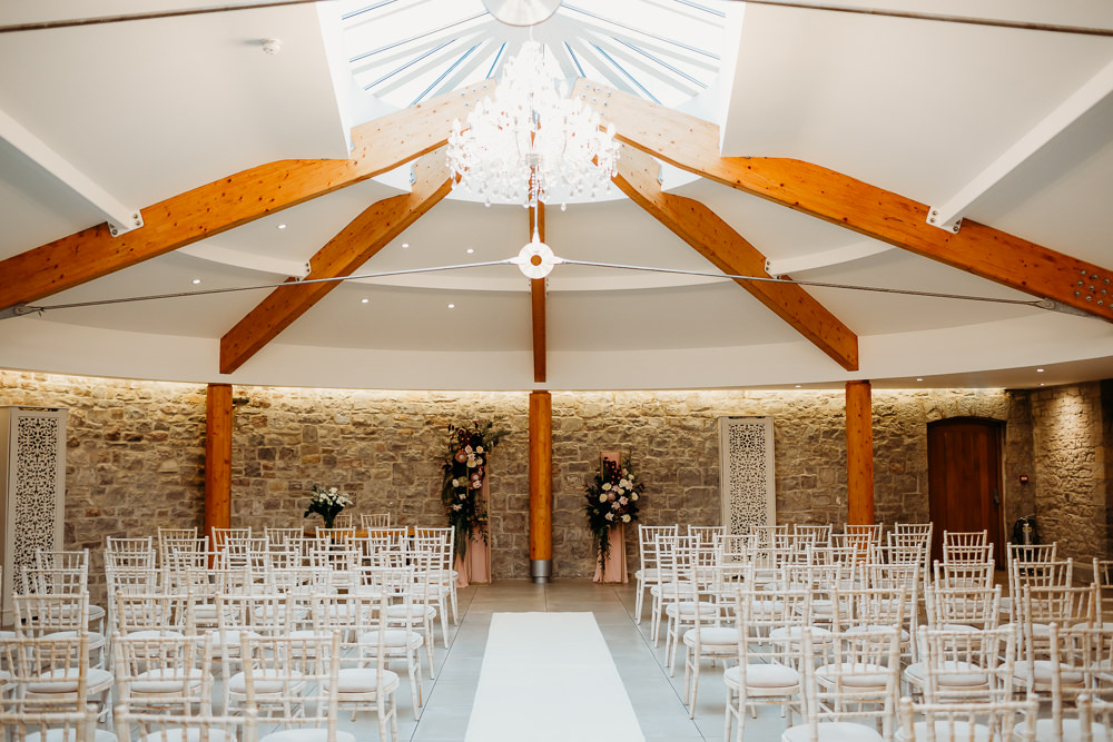 Flower Installation Backdrop Ceremony Aisle Protea Rose St. Tewdrics House Wedding When Charlie Met Hannah