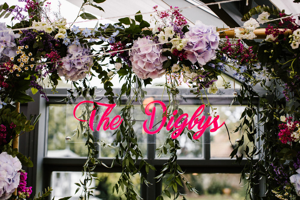 Flower Arch Backdrop Top Table Sign Hydrangea Wisteria Titchwell Manor Wedding Honey and The Moon Photography