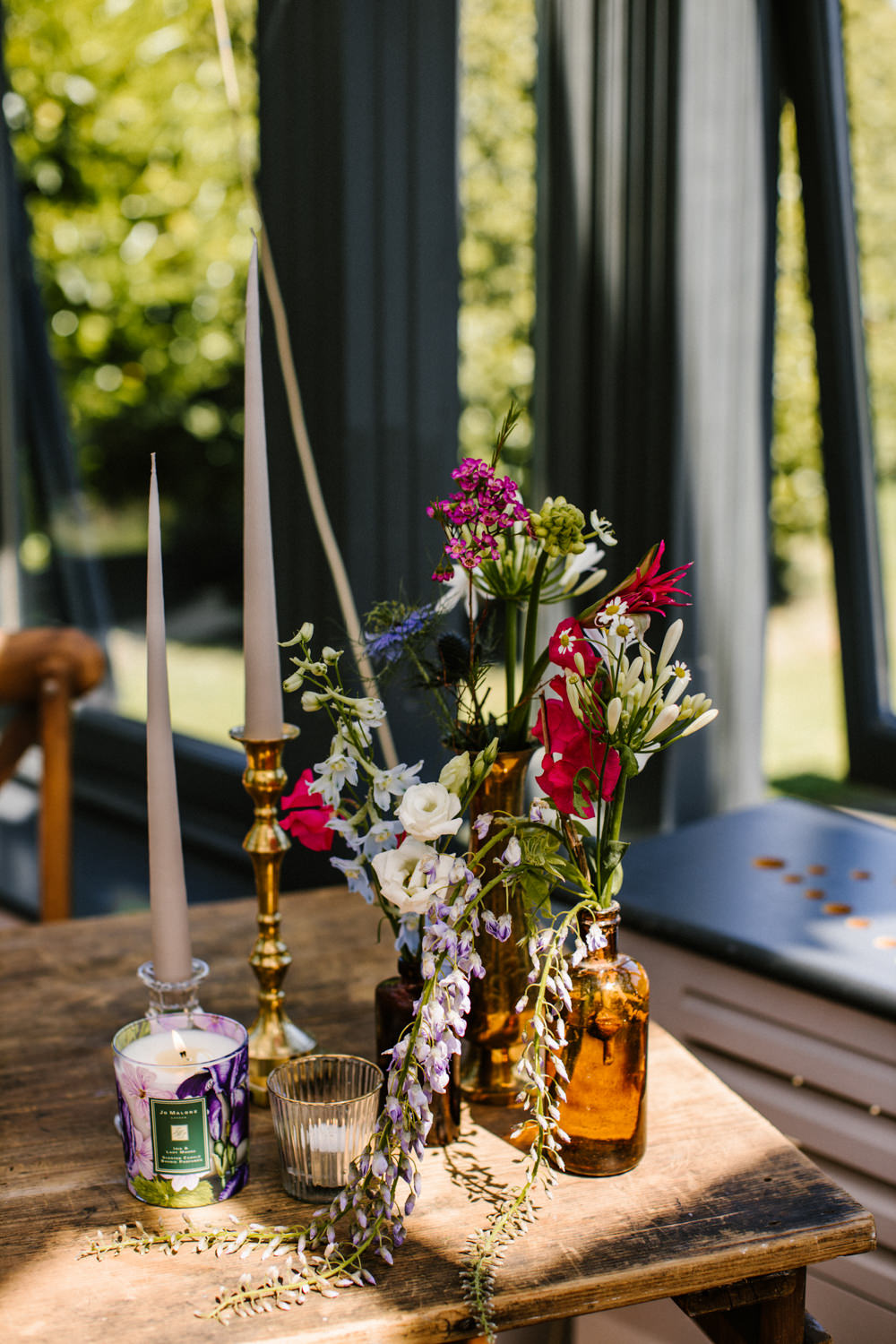 Table Flowers Bottles Candles Decor Titchwell Manor Wedding Honey and The Moon Photography