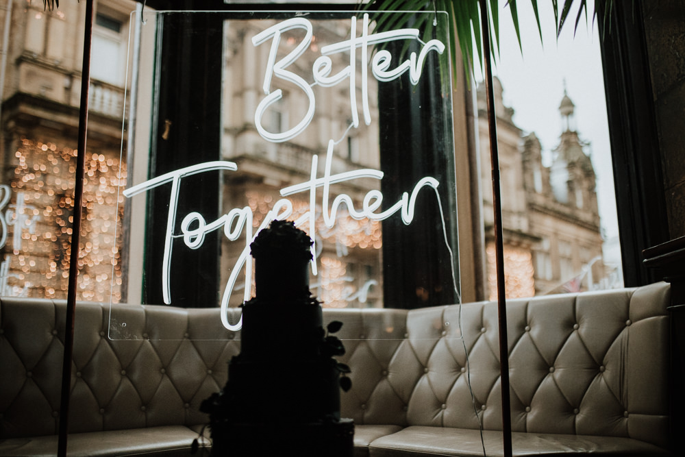 Neon Sign Backdrop Tropical Flowers Black Wedding Ideas Taylar-Jayde Photography