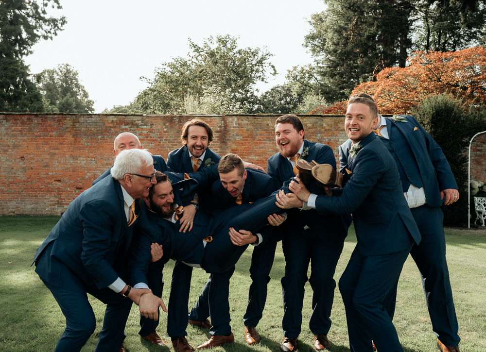 Groom Suit Navy Mustard Yellow Tie Pocket Square Groomsmen Combermere Abbey Wedding Damian Brandon Photography