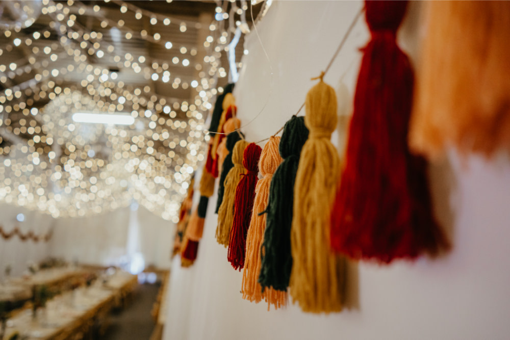 Tassel Garland Decor Literary Wedding Naomi Jane Photography