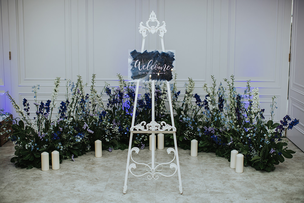 Welcome Sign Blue Celestial Flower Meadow Candles Moon Stars Wedding Ideas Olegs Samsonovs Photography
