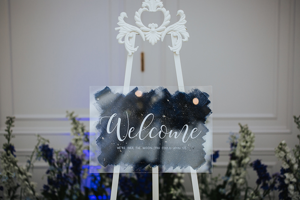 Welcome Sign Blue Celestial Flower Meadow Candles Moon Stars Wedding Ideas Olegs Samsonovs Photography