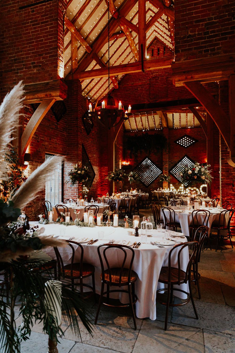 Centrepiece Tall Flowers Candles Decor Round Tables Shustoke Barn Wedding Oxi Photography