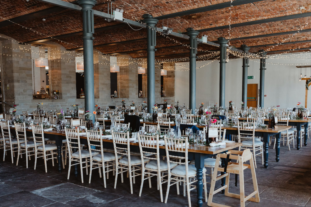 Warehouse Industrial Reception Long Tables Fairy Light Canopy Lighting Arches Dean Clough Wedding Stevie Jay Photography