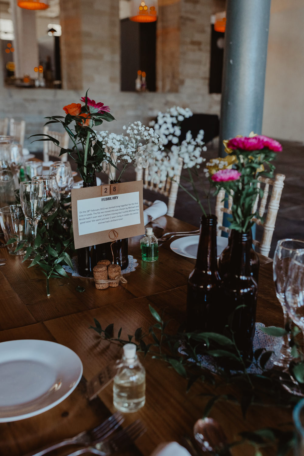 Table Decor Centrepiece Flowesr Bottle Flowers Arches Dean Clough Wedding Stevie Jay Photography