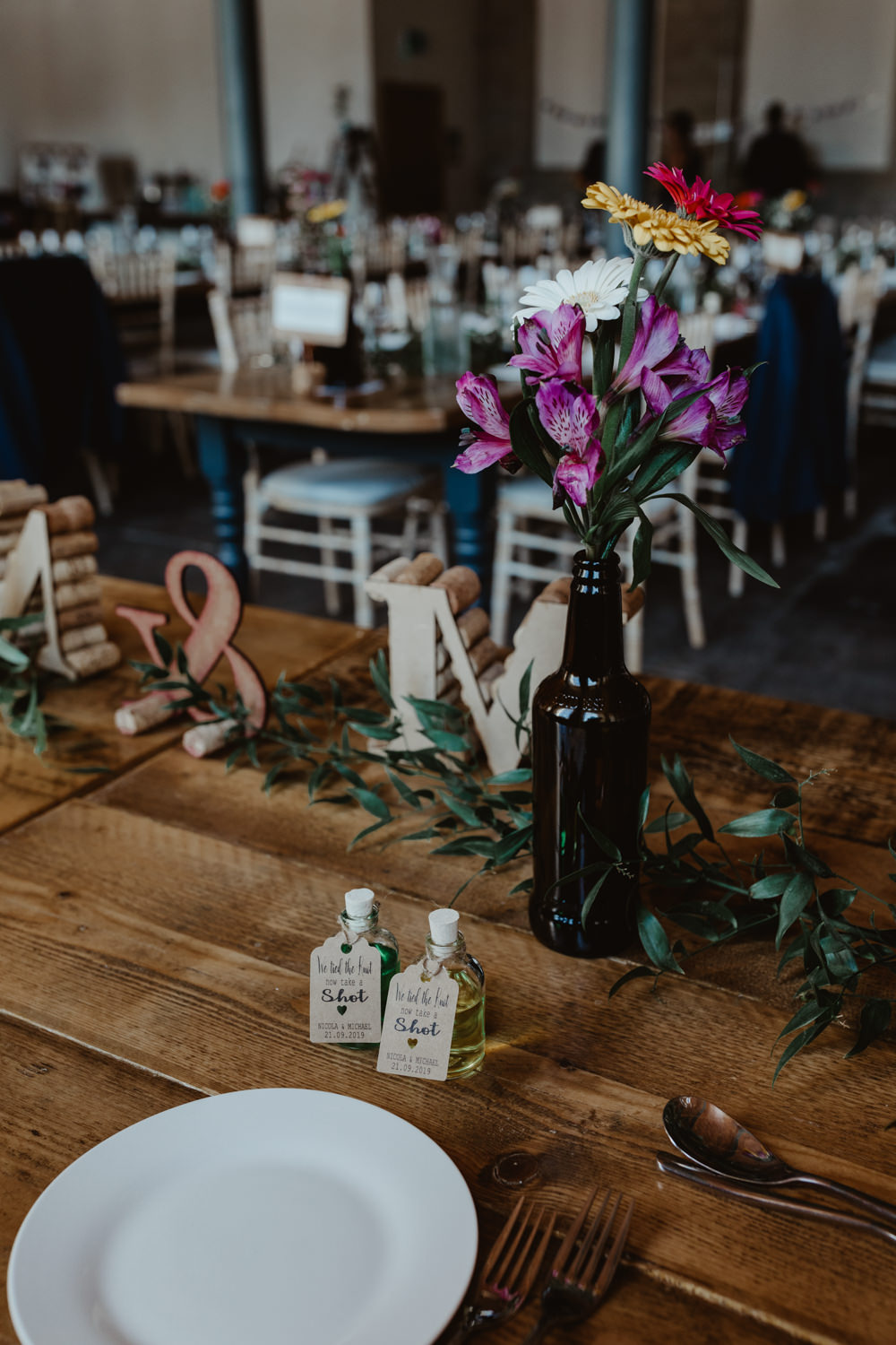 Table Decor Centrepiece Flowesr Bottle Flowers Arches Dean Clough Wedding Stevie Jay Photography