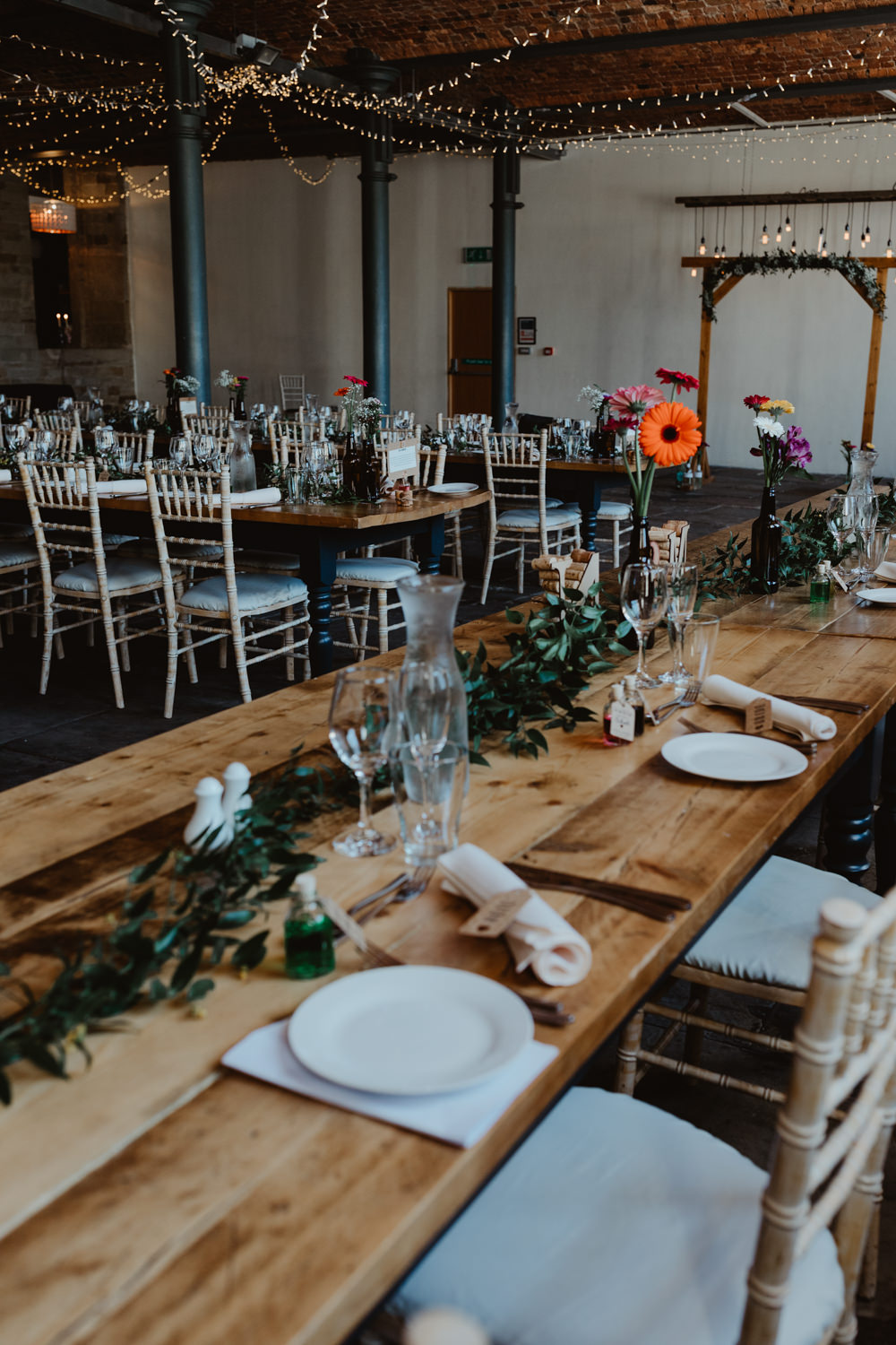 Table Decor Centrepiece Flowesr Bottle Flowers Arches Dean Clough Wedding Stevie Jay Photography