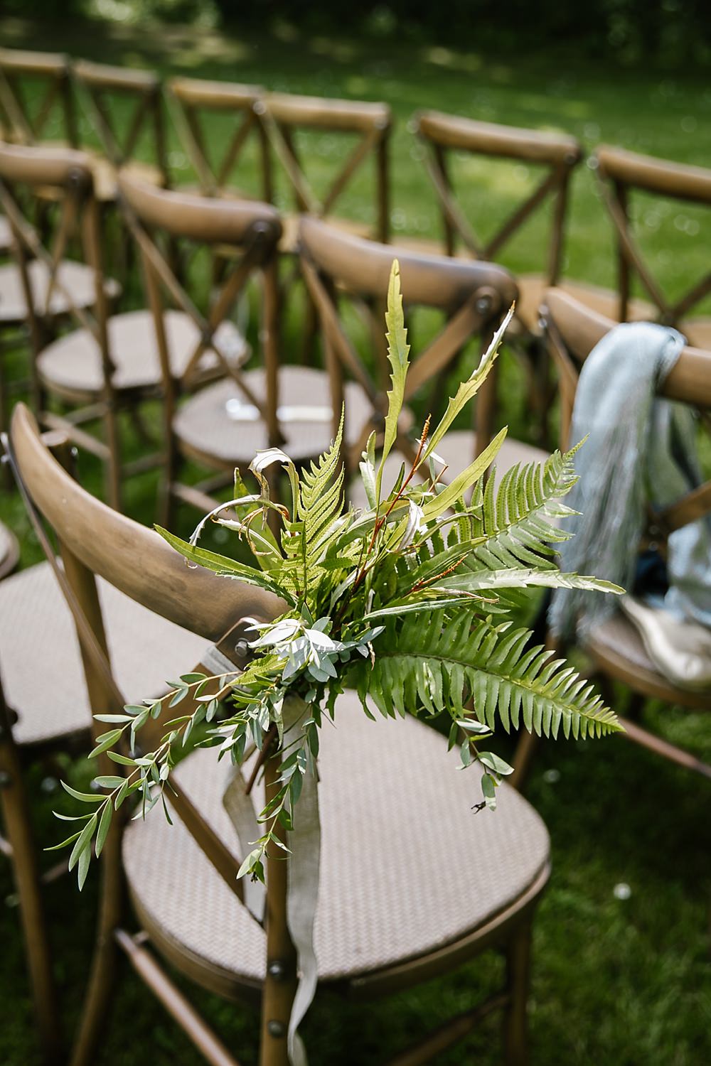 Pew End Chair Aisle Flowers Ferns Chaucer Barn Wedding Katherine Ashdown Photography