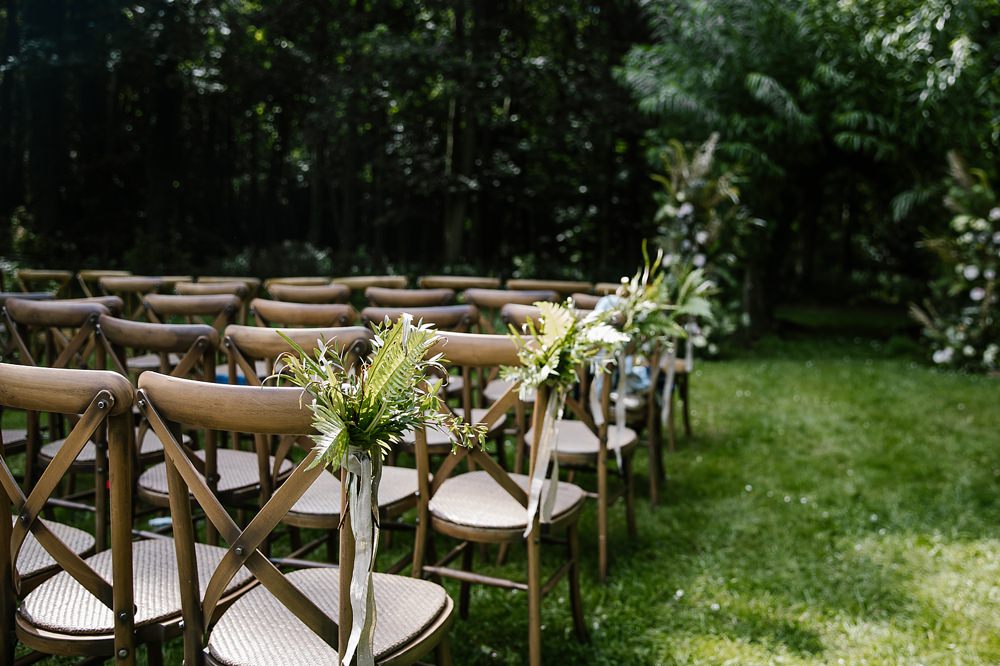 Pew End Chair Aisle Flowers Ferns Chaucer Barn Wedding Katherine Ashdown Photography