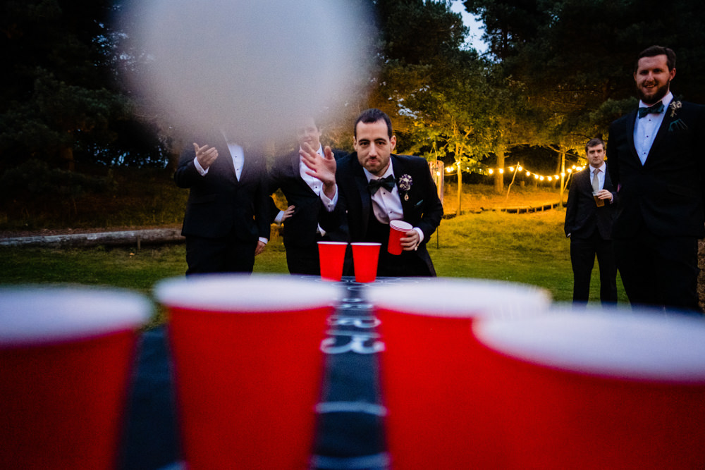 Beer Pong Game Cowshed Woodhall Farm Wedding Emma and Rich