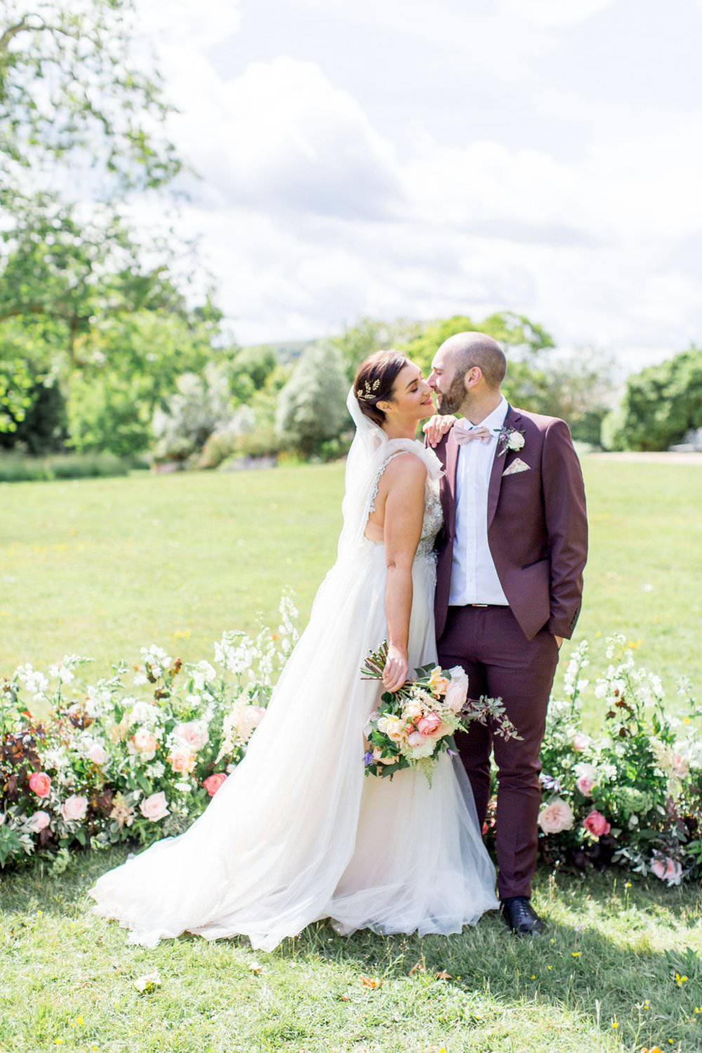 English Garden Wedding Inspiration Philippa Sian Photography Meadow Flowers Ceremony Backdrop Arrangement Dress Gown Bride Bridal Straps Tulle Veil