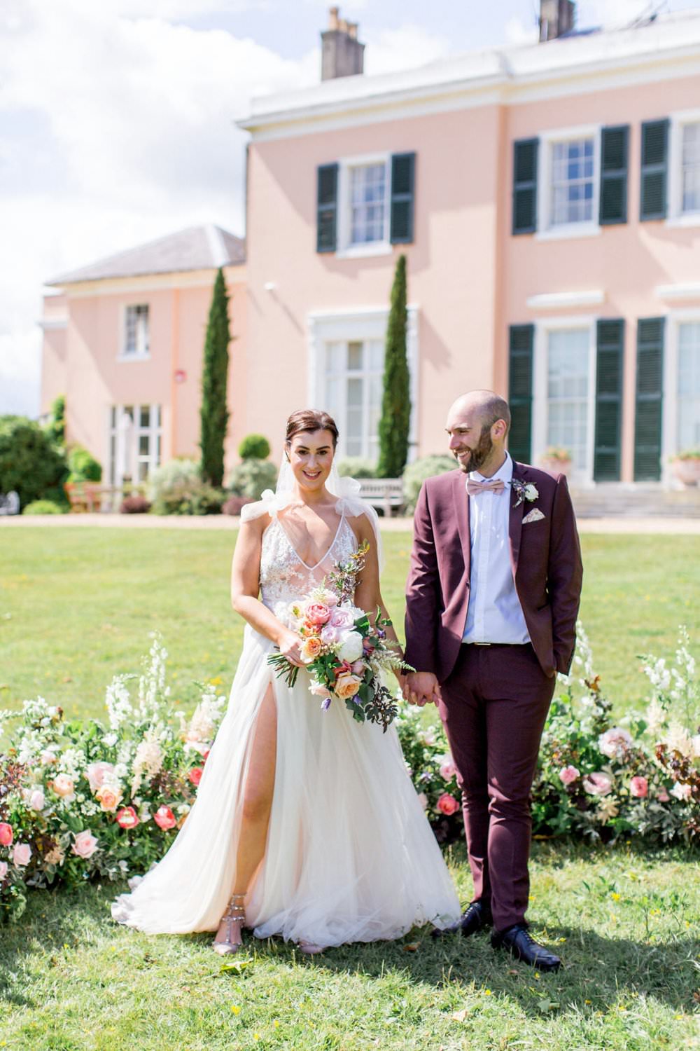English Garden Wedding Inspiration Philippa Sian Photography Meadow Flowers Ceremony Backdrop Arrangement Dress Gown Bride Bridal Straps Tulle Split Skirt