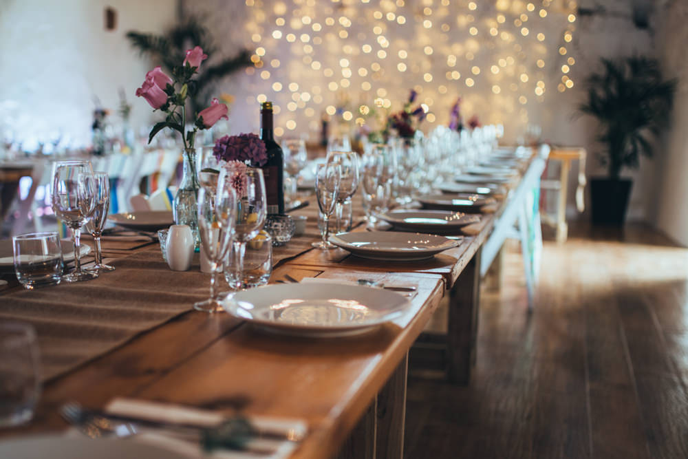 Long Wooden Tables Decor Decorations Flowers Bottles Old Barn Wedding Joshua Rhys Photography