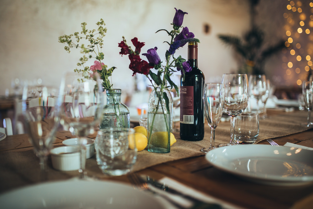 Long Wooden Tables Decor Decorations Flowers Bottles Old Barn Wedding Joshua Rhys Photography