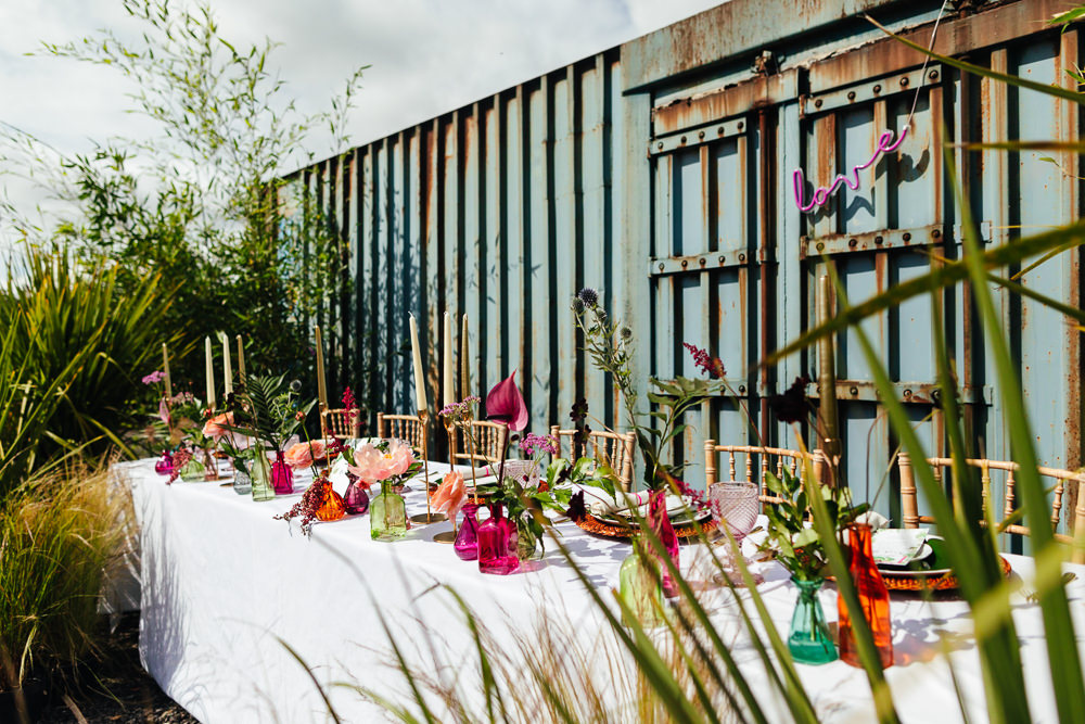Outdoor Table Tablescape Flowers Candles Tropical Wedding Inspiration Emily Little Photography