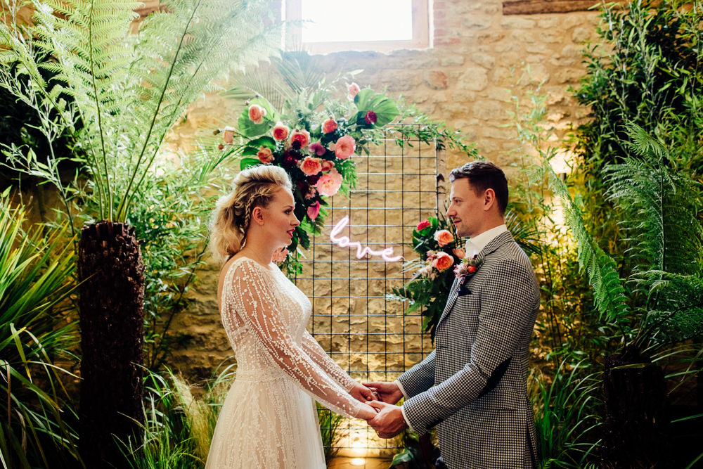 Ceremony Backdrop Plants Greenery Foliage Neon Sign Tropical Wedding Inspiration Emily Little Photography