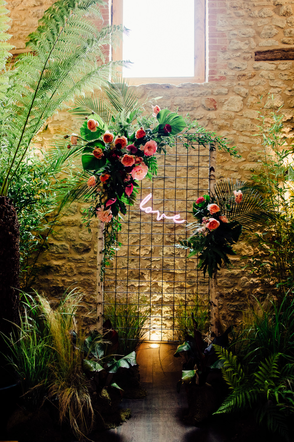 Ceremony Backdrop Plants Greenery Foliage Neon Sign Tropical Wedding Inspiration Emily Little Photography