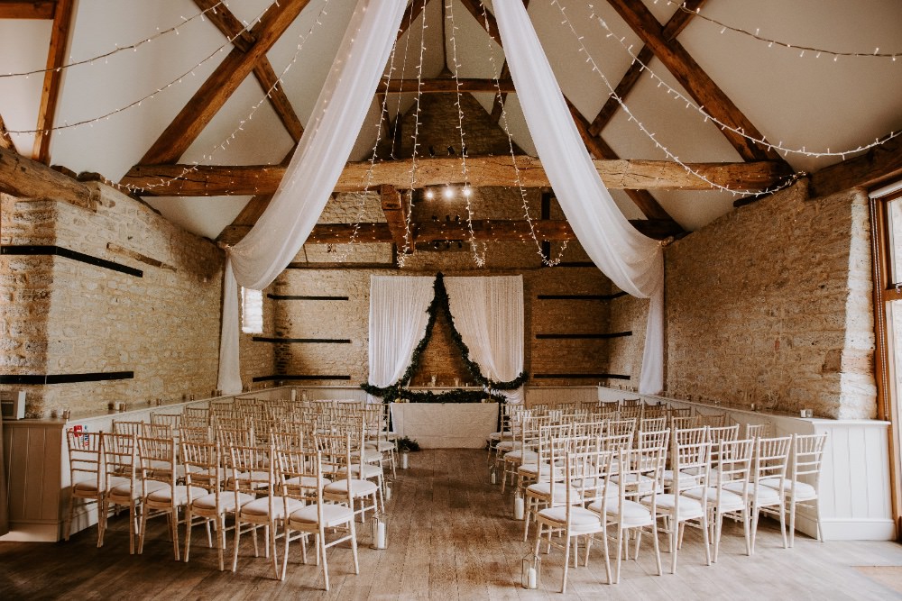Barn Ceremony Backdrop Drapes Fabric Greenery Fairy Lighs Lighting Canopy Wick Farm Bath Wedding Siobhan Beales Photography