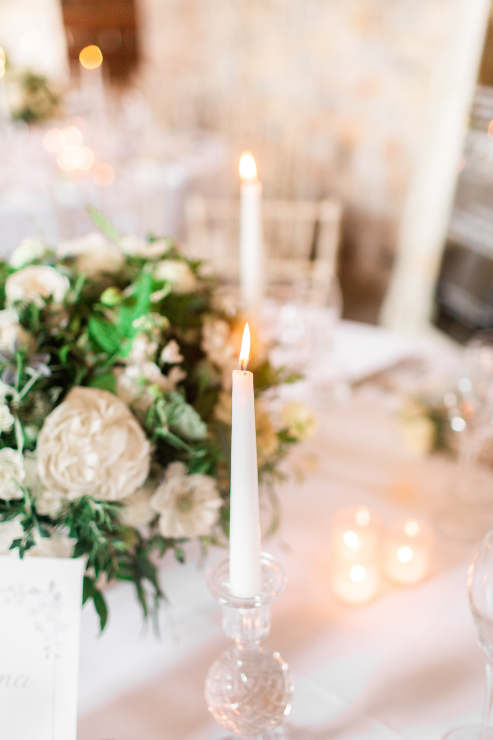 Table Centrepiece Decor Flowers Candlesticks Almonry Barn Wedding Kerry Bartlett Photography