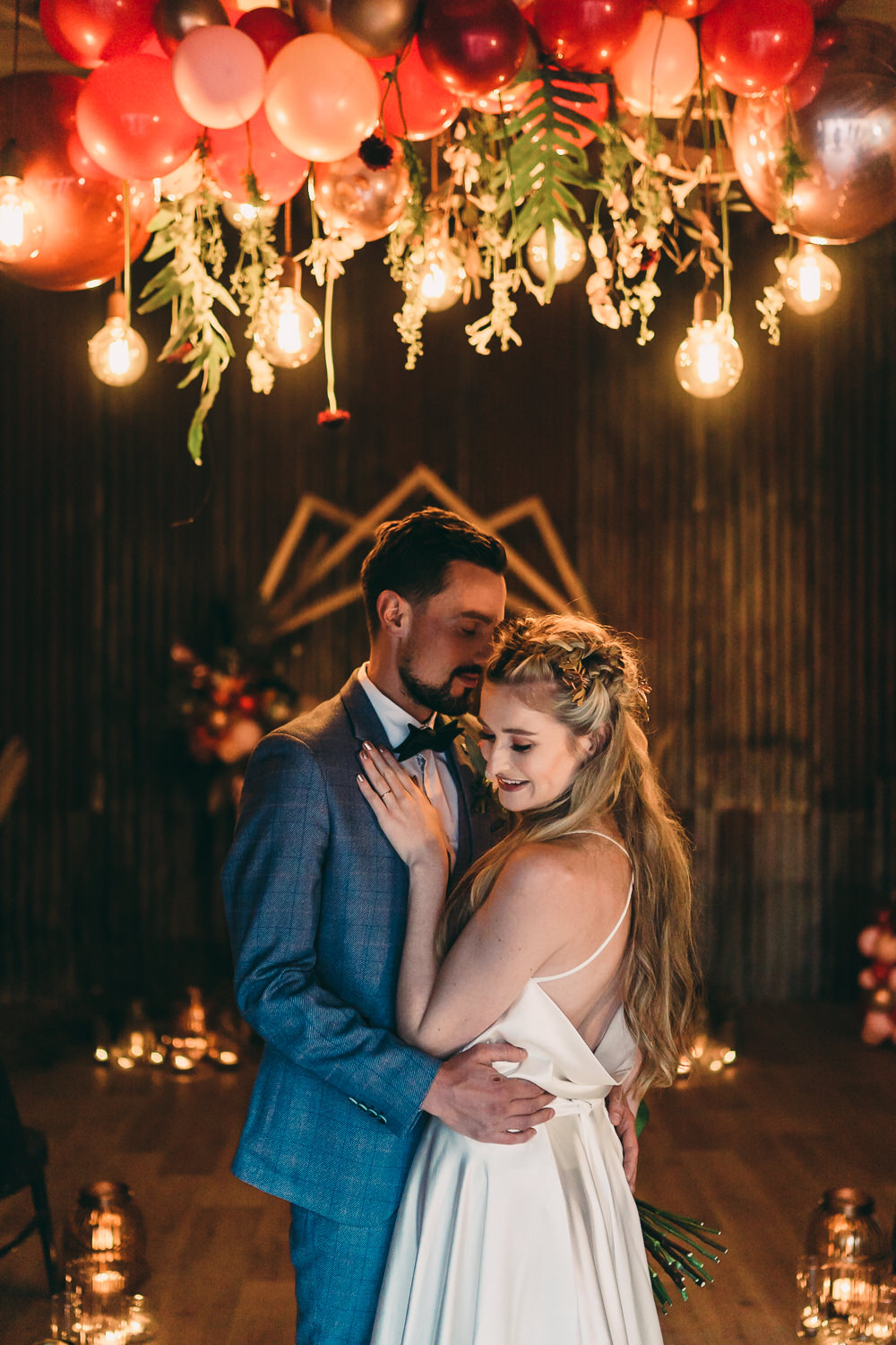 Balloon Wedding Ideas Leesha Williams PhotographyGeometric Backdrop Balloons Candles Ceremony Aisle Installation Hanging Suspended Edison Light Bulbs Lighting