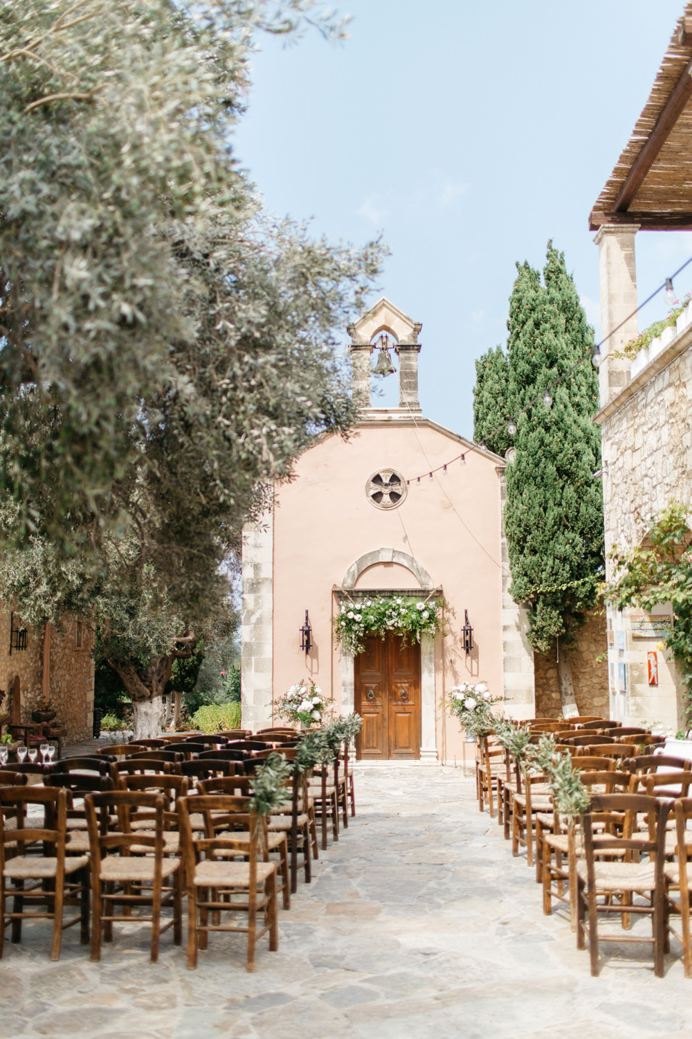 Ceremony Aisle Flowers Tall Doorway Arch Backdrop Crete Wedding HannaMonika Wedding Photography
