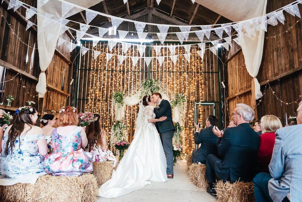 Backdrop Ceremony Fabric Flowers Arch DIY Barn Wedding Jessica Grace Photography