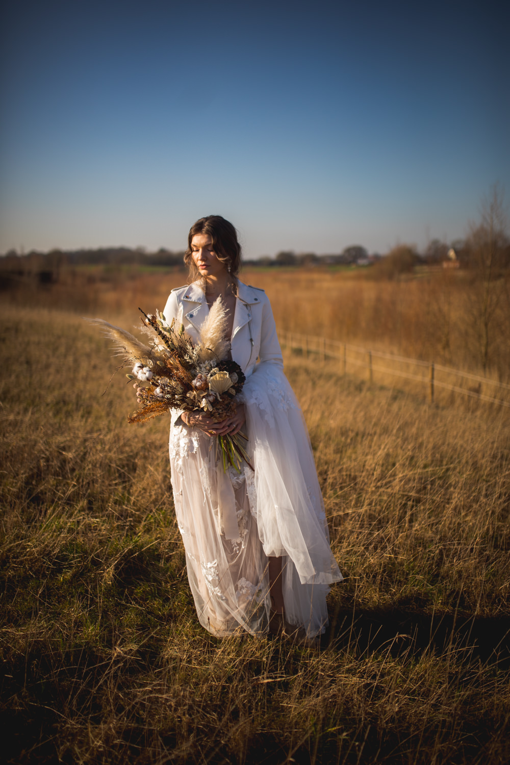 Dress Gown Bride Brdal Blush Lace Tulle Madi Lane Bespoke Painted Leather Jacket Dried Flower Wedding Ideas Dan Lambourne Photography