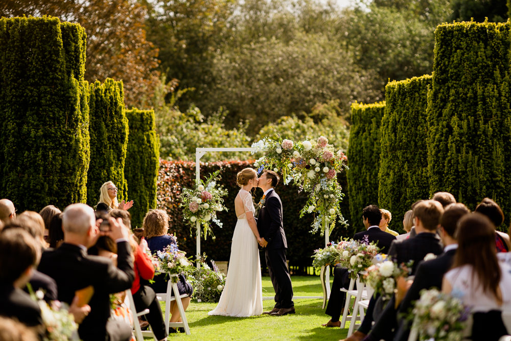 Outdoor Garden Ceremony Flower Arch Aisle Flowers Holford Estate Wedding Voyteck Photography