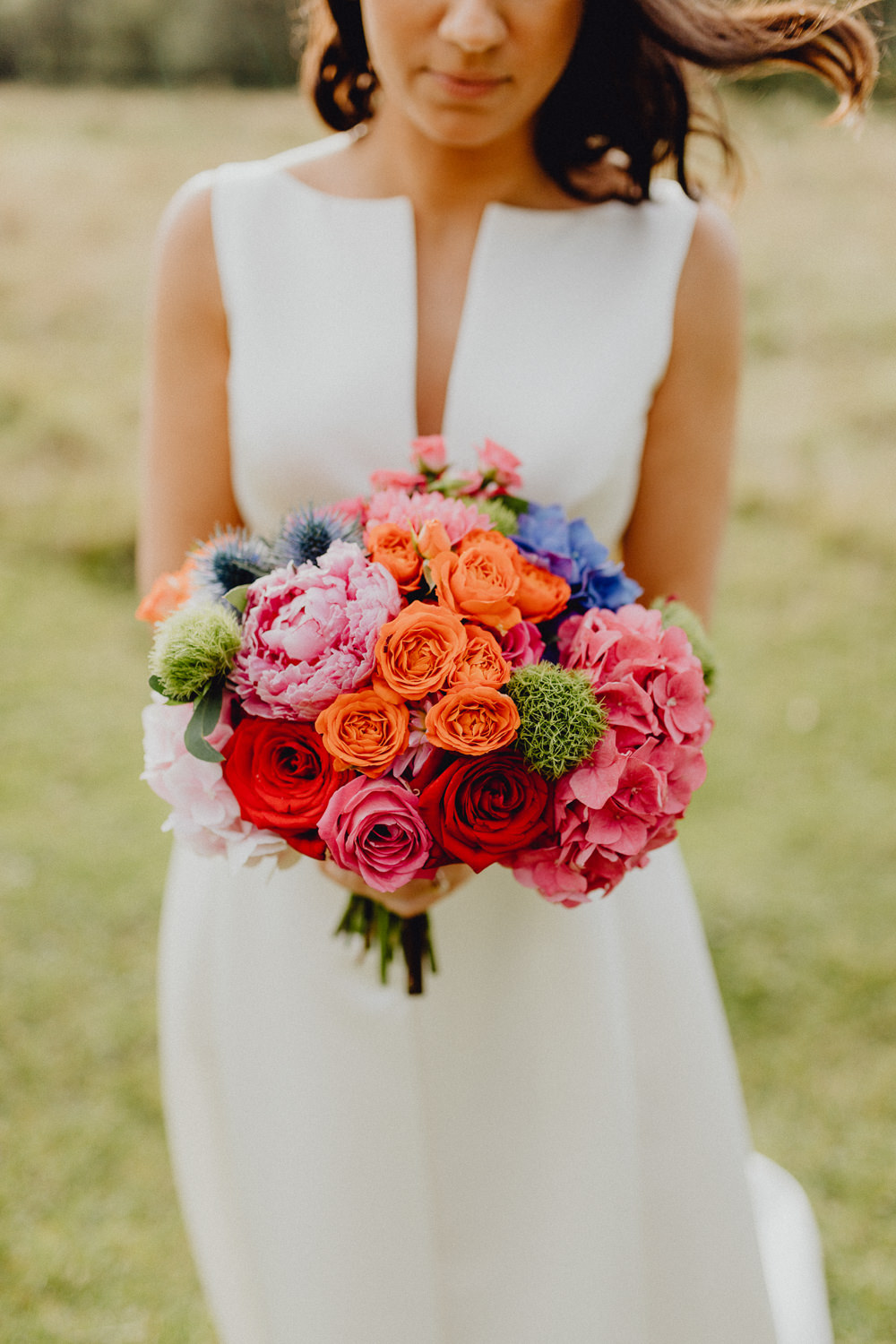 Bouquet Flowers Bride Bridal Colourful Hydrangeas Ranunculi Peonies Orange Pink Intimate Pub Wedding Heather Sham Photography