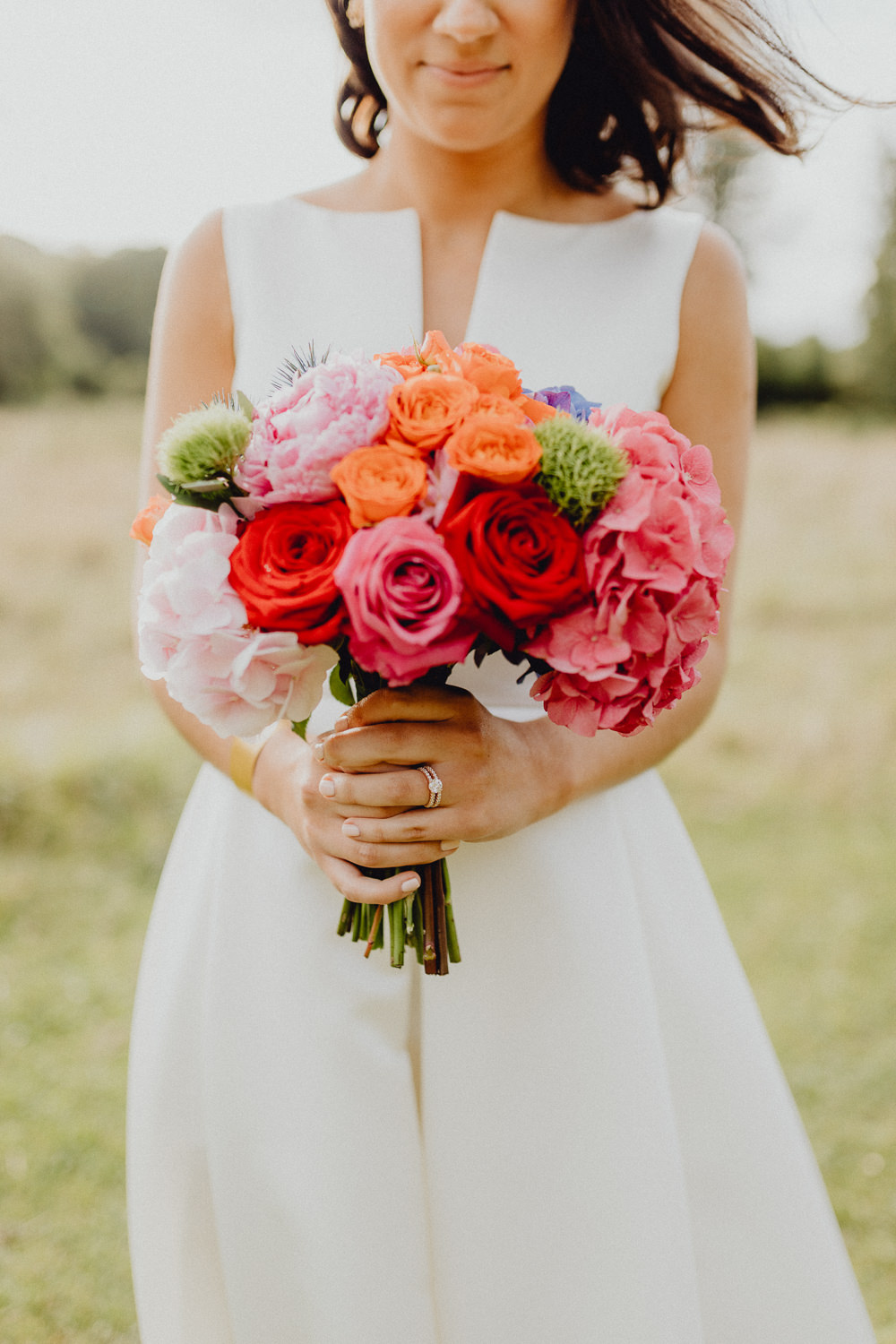 Bouquet Flowers Bride Bridal Colourful Hydrangeas Ranunculi Peonies Orange Pink Intimate Pub Wedding Heather Sham Photography