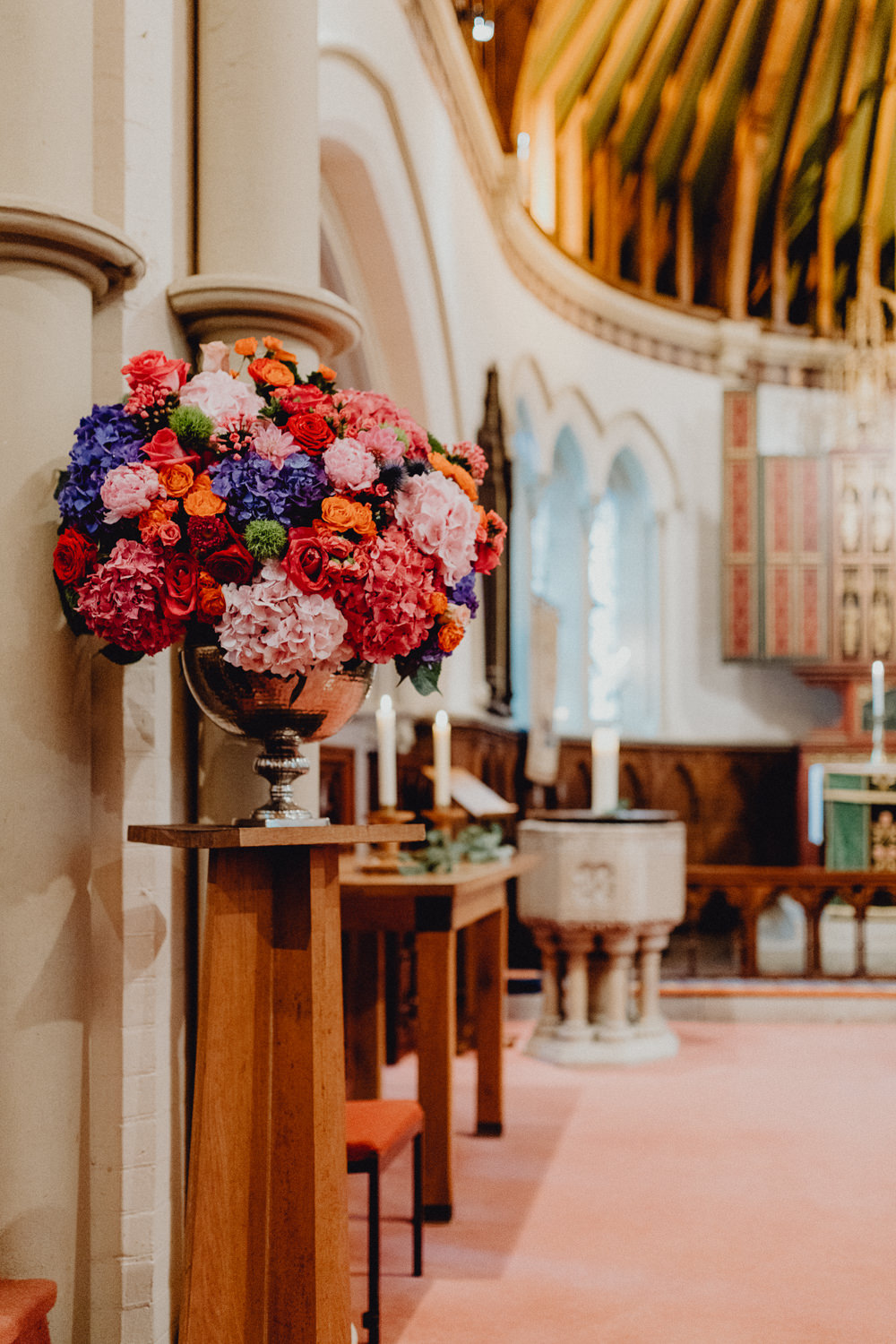 Church Flowers Arrangement Display Colourful Hydrangeas Ranunculi Peonies Intimate Pub Wedding Heather Sham Photography