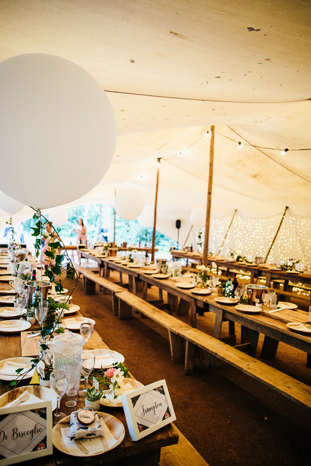 Stretch Tent Marquee Pole Long Trestle Tables Giant Balloons Decor Lila’s Wood Wedding Two-D Photography