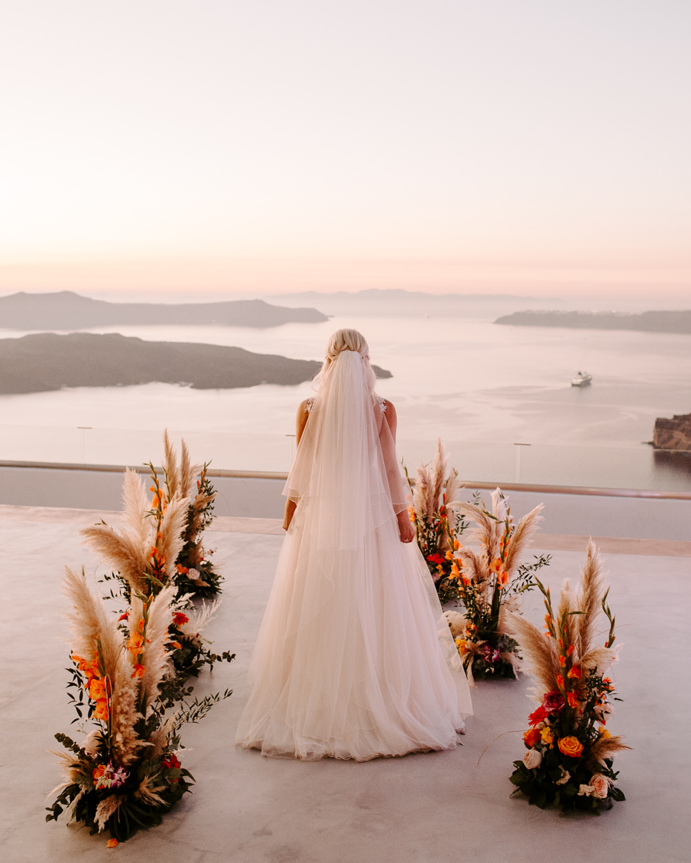 Aisle Ceremony Flowers Pampas Grass Bride Bridal Dress Gown Muse by Berta Lace Tulle Veil Santorini Wedding Phosart Photography