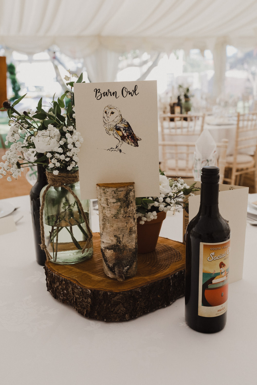 Table Centrepiece Log Slice Jar Flowers Animal Nature Table Names Seaside Wedding Oli and Steph Photography