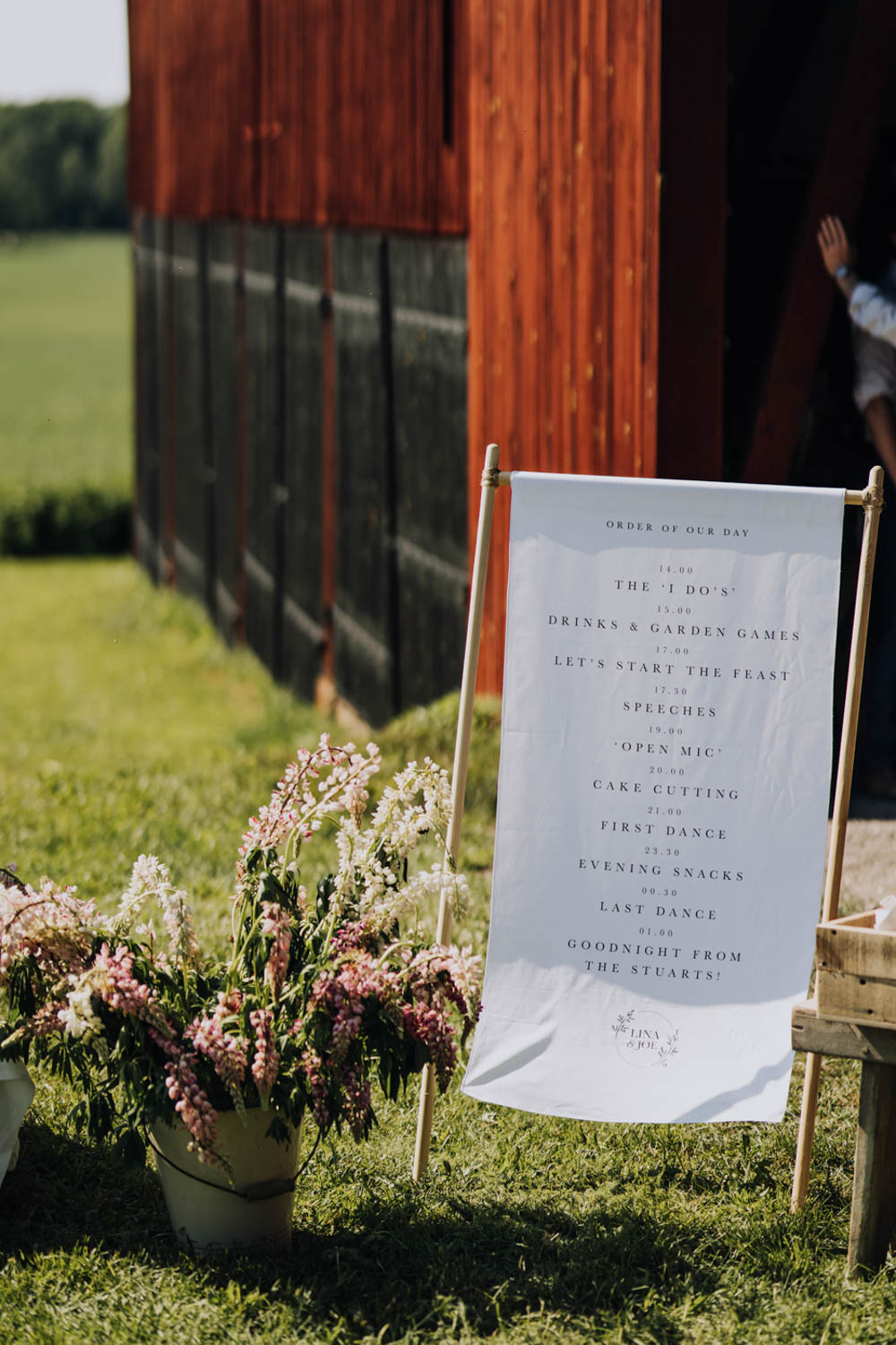 Welcome Sign Signs Signage Fabric Banner Flowers Sweden Destination Wedding Clara Cooper Photography