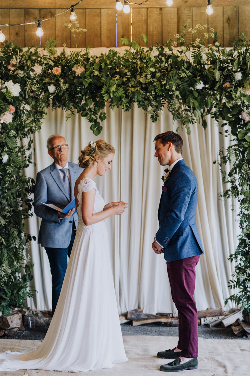 Flower Arch Backdrop Ceremony Aisle Greenery Foliage Sweden Destination Wedding Clara Cooper Photography