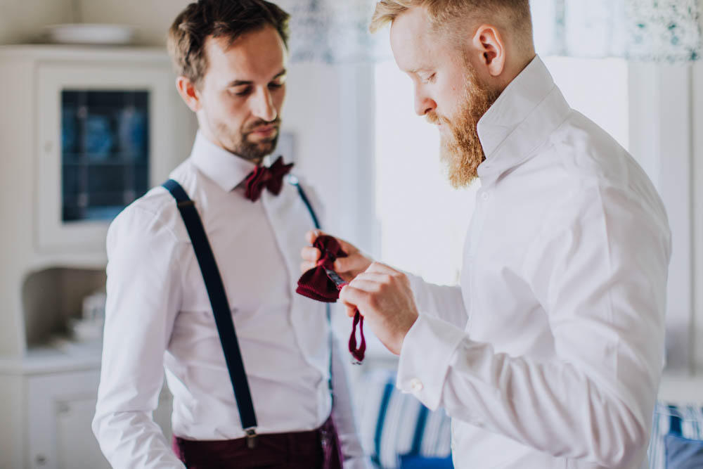 Groom Groomsmen Suit Blue Bow Tie Braces Sweden Destination Wedding Clara Cooper Photography