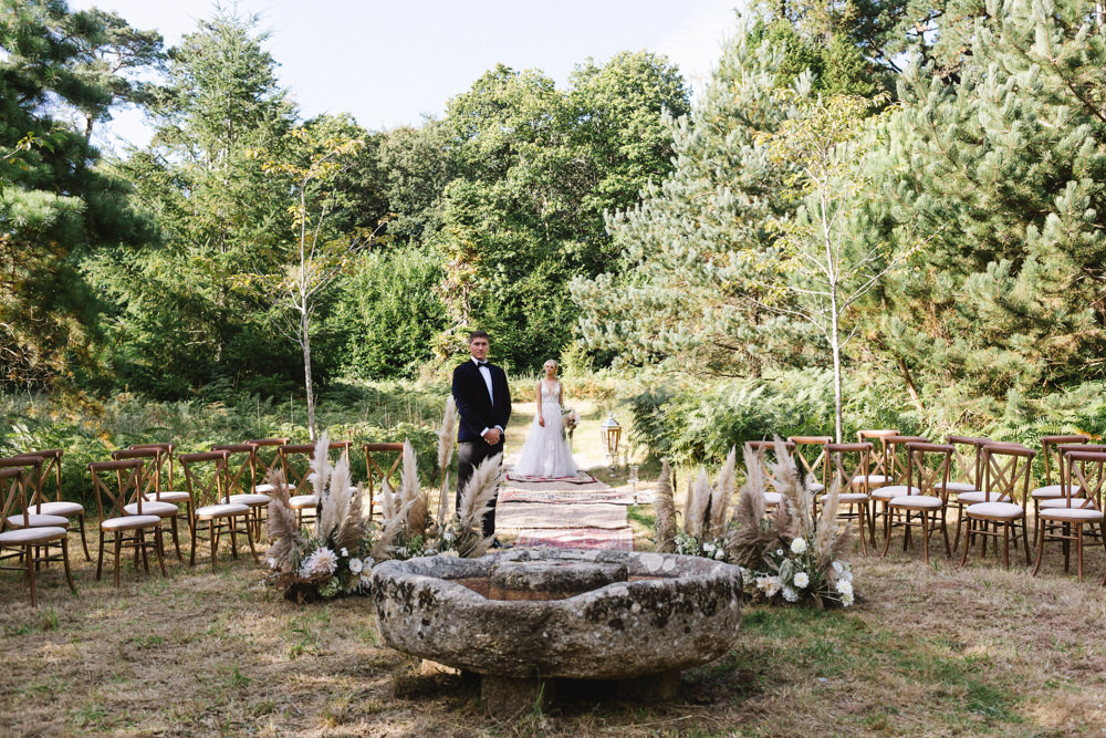 Ceremony Woodland Outdoor Circle Round Chairs Flowers Pampas Grass Palm Leaves Dahlias Aisle Boconnoc Wedding Debs Alexander Photography