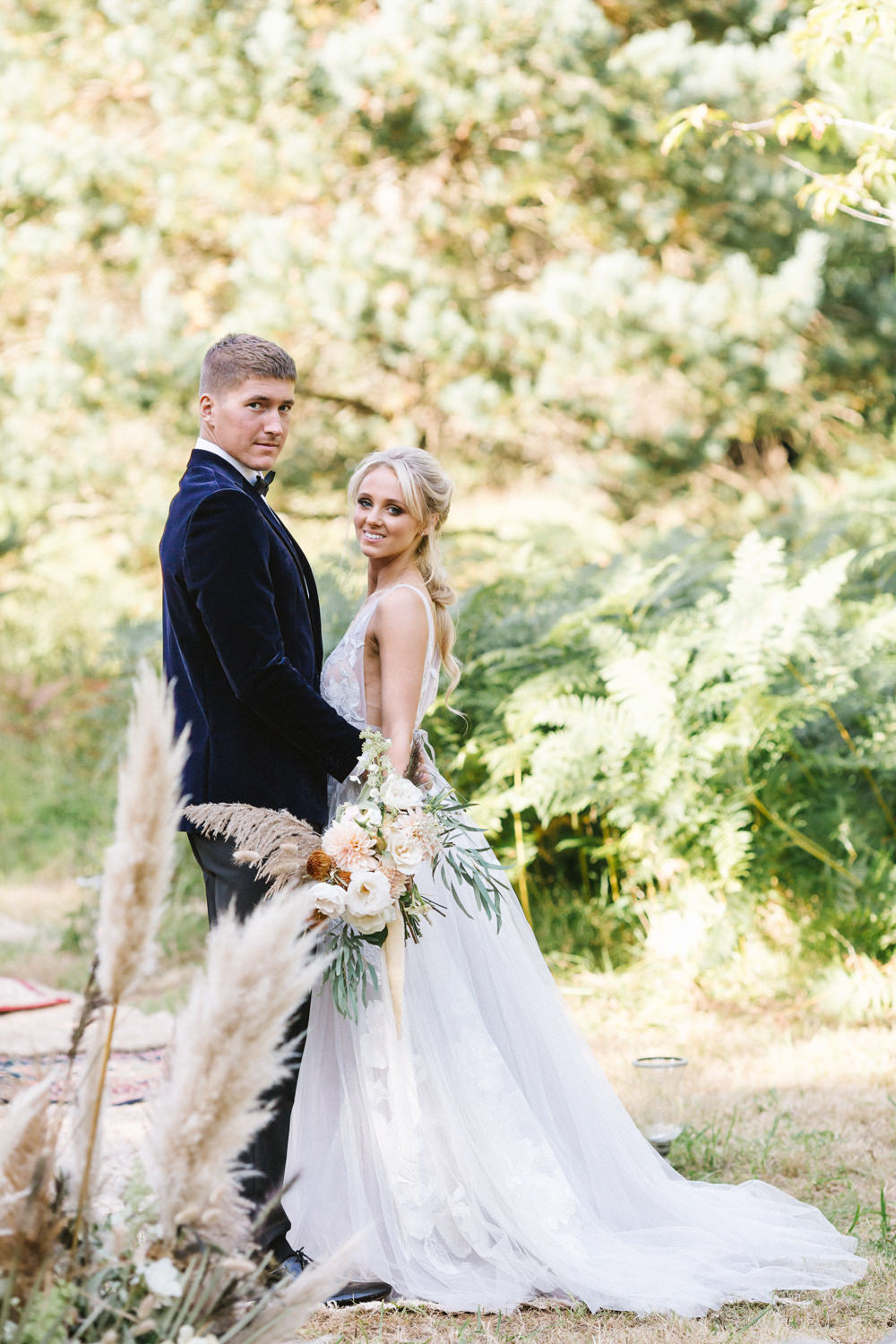 Ceremony Woodland Outdoor Circle Round Chairs Flowers Pampas Grass Palm Leaves Dahlias Aisle Dress Gown Bride Bridal Willowby Embroided Boconnoc Wedding Debs Alexander Photography