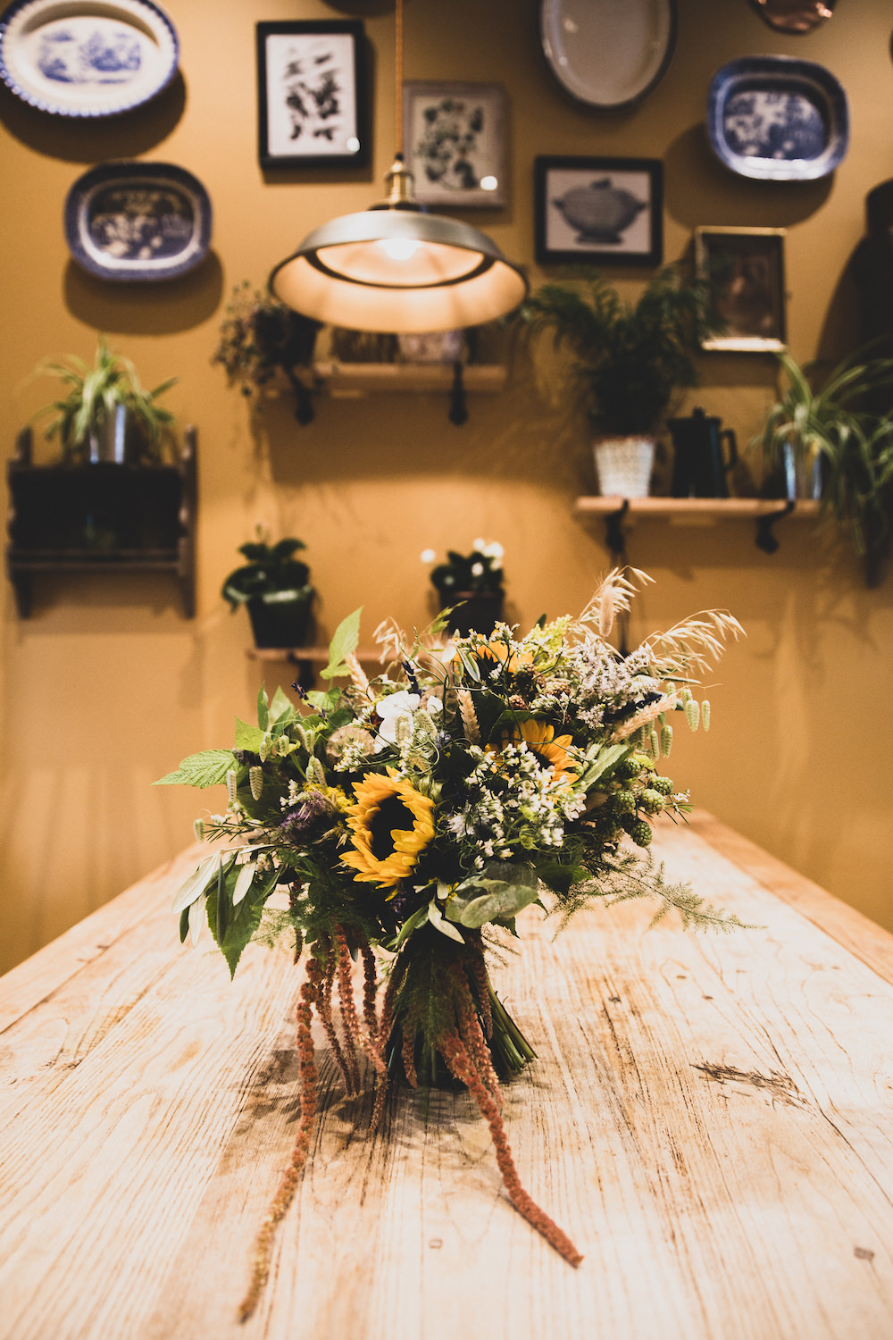 Bouquet Flowers Bride Bridal Sunflower Sundlowers Greenery Foliage Burley Manor Wedding Becky Bailey Photographer