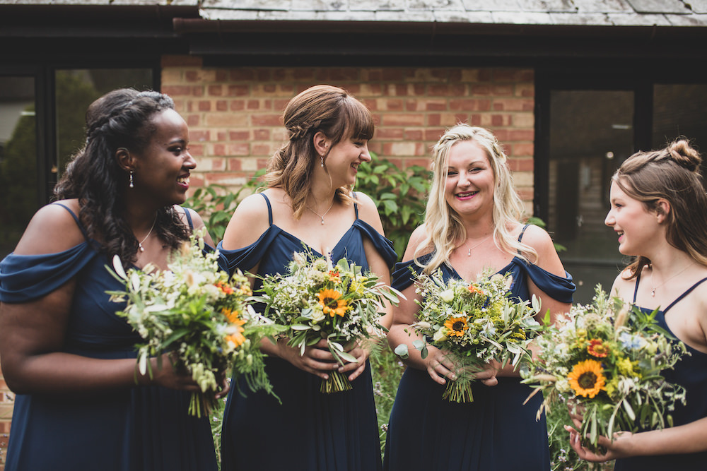 Bouquet Flowers Bride Bridal Sunflower Sundlowers Greenery Foliage Bridesmaids Burley Manor Wedding Becky Bailey Photographer