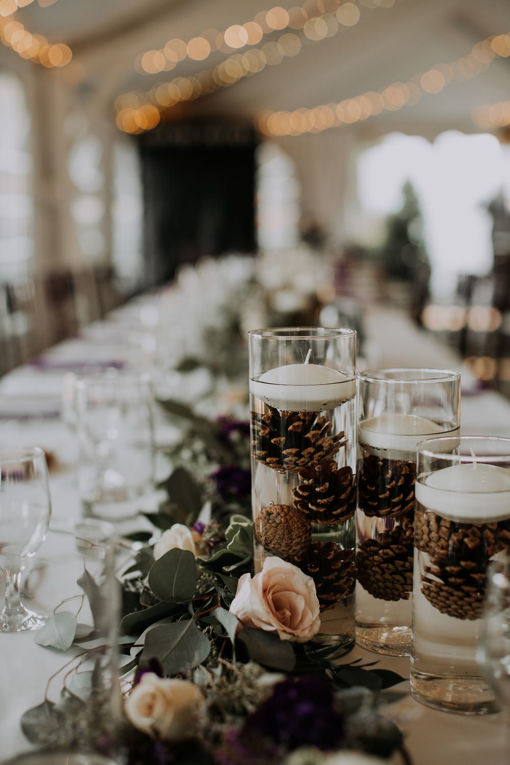 Candles Pine Cones Centrepiece Decor Greenery Cedar Creek Ranch Wedding Dani Nicole Photography