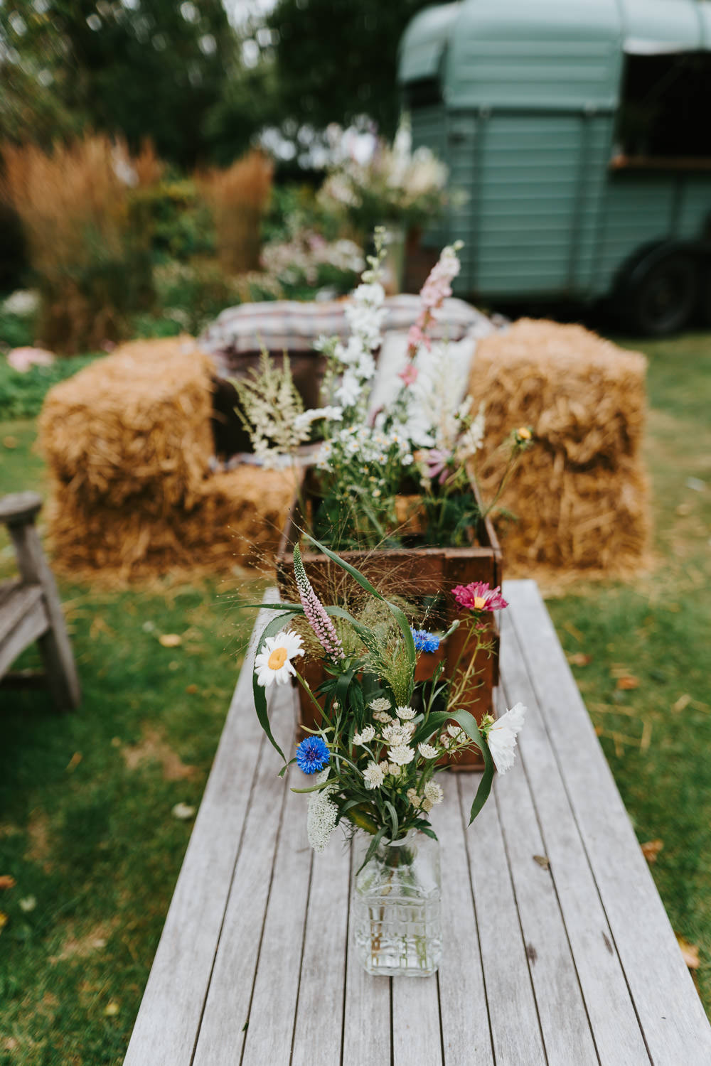 Garden Decor Flowers Hay Bales Country Festival Wedding Jonny Gouldstone Photography