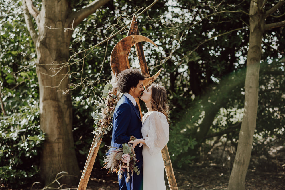 Crescent Moon Celestial Backdrop Triangle Wooden Arch Ceremony Aisle Navy Gold Wedding Ideas Gina Fernandes Photography