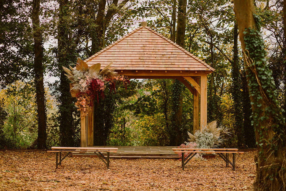 Wooden Arch Gazebo Flowers Woodland Backdrop Outdoor Autumn Wedding Ruby Walker Photography