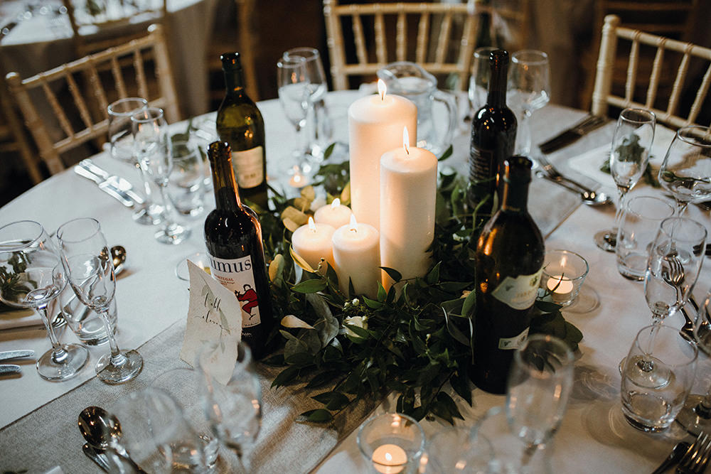 Centrepiece Table Flowers Candles Greenery Foliage Preston Priory Barn Wedding Leah Lombardi Photography