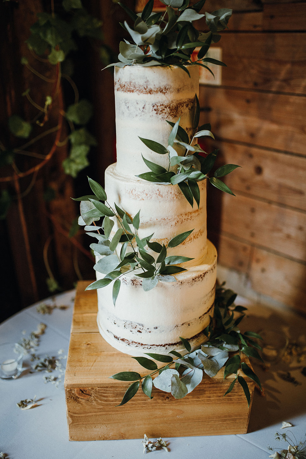 Tall Semi Naked Cake Greenery Foliage Preston Priory Barn Wedding Leah Lombardi Photography